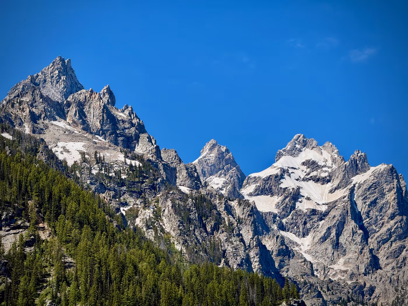 The Teton peaks seen across Jenny Lake.