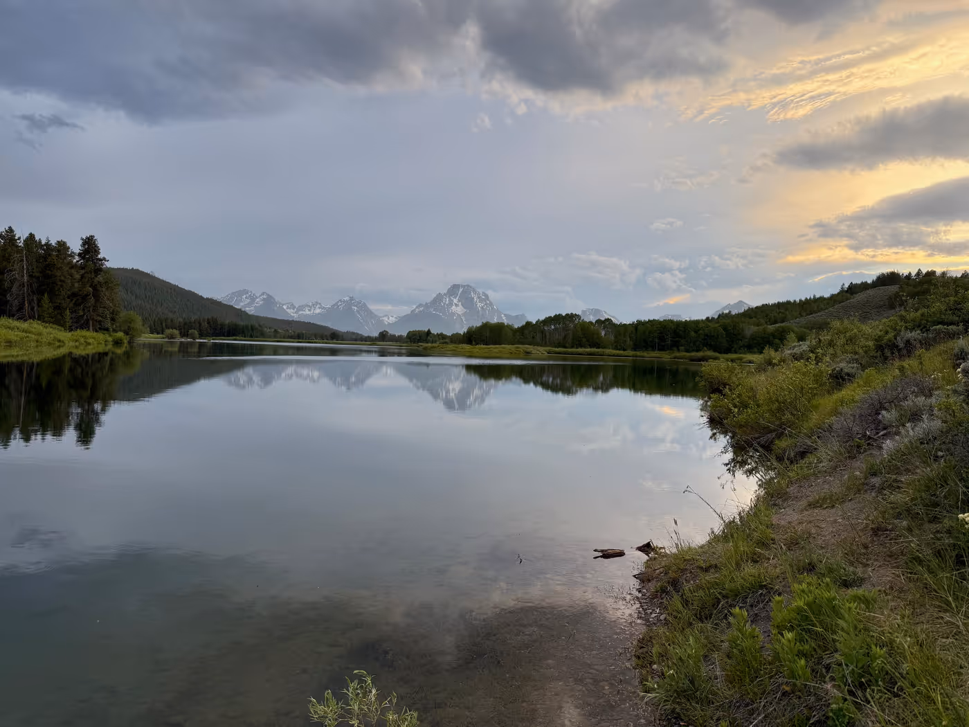 Mount Moran reflected in the calm water of Oxbow Bend.