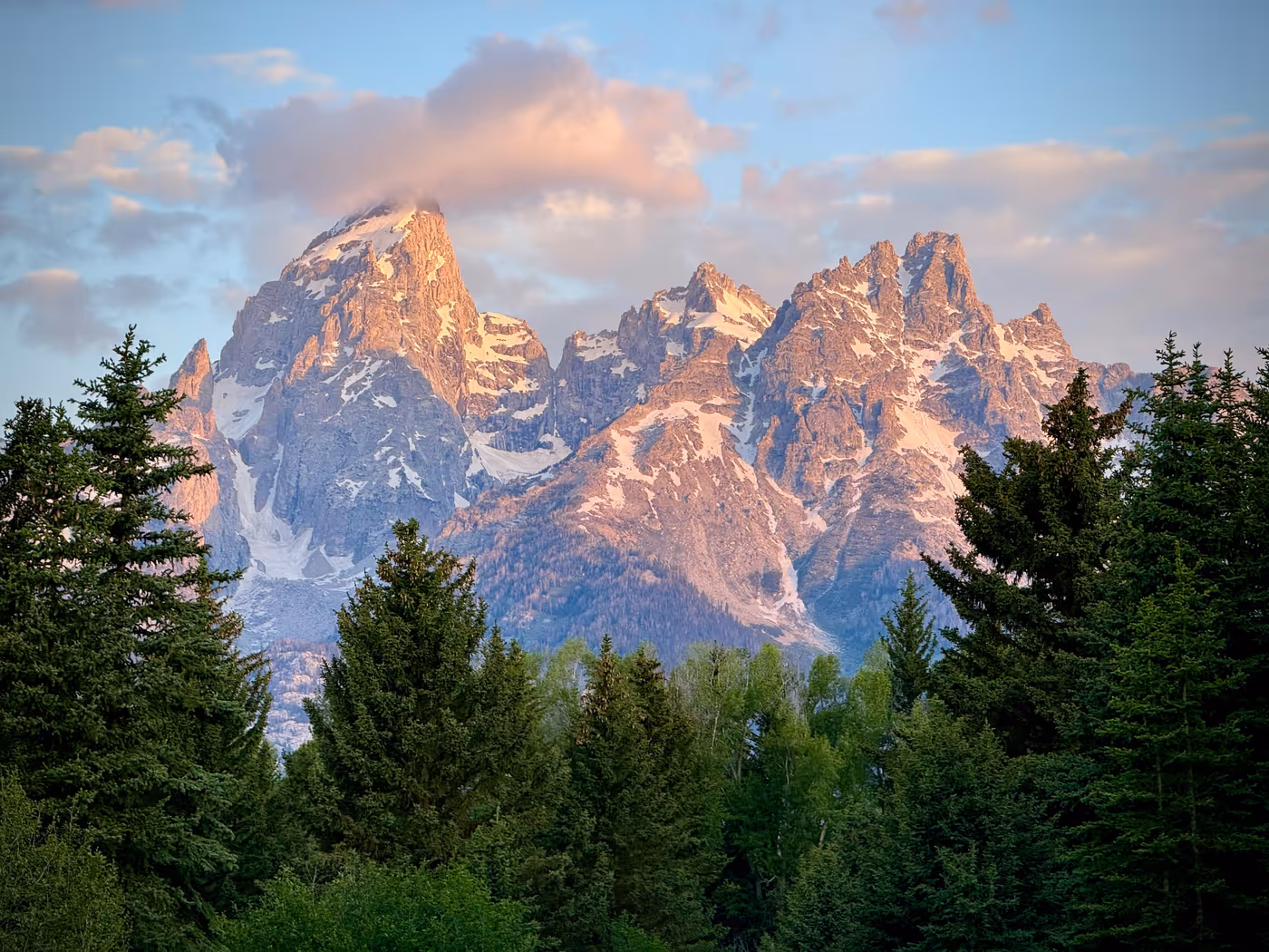 Sunlit Teton peaks in morning light.